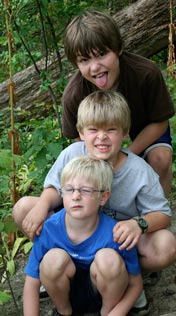 James, Will, Charlie as a totem pole