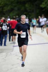 Dave Windahl crossing the finish line at the 2011 hermes river run