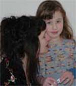 mom and daughter hugging