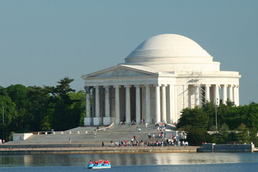 A daytime photograph of the Thomas Jefferson Memorial taken from across the Tidal Basin.