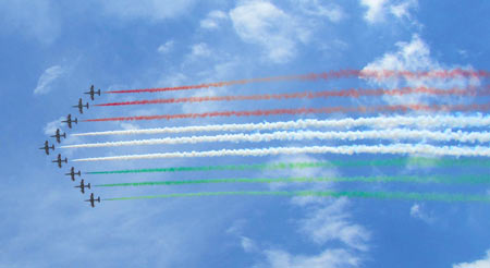 Planes blowing red, green and white smoke in celebration of Italian heritage.