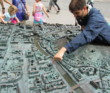 Andrew points to where we were staying on a relief map of the city.