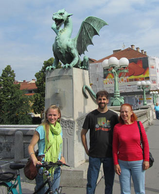 Andrew, Justina and Rebecca standing next to the dragon bridge.