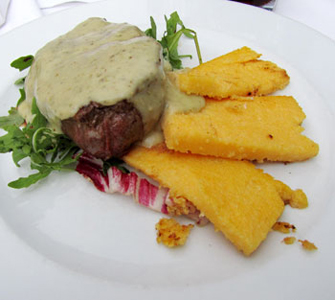 Colt steak with mushroom sauce and polenta.