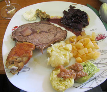 A plate full of traditional Slovenian food