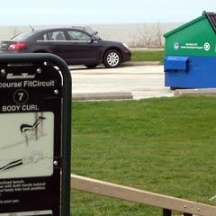 Exercise station: body curl, and recycling bin