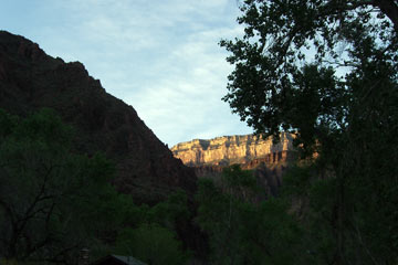 Early morning sun lighting high canyon wall