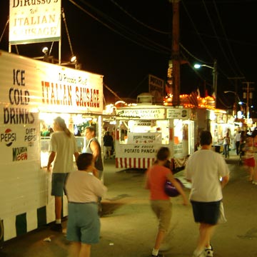 County fair midway at night, Italian sausage stand