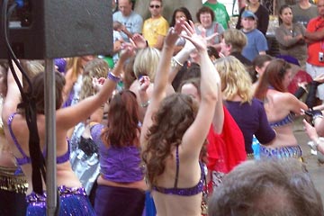 Lots of costumed dancers in Market Square Park, Cleveland
