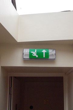 Exit sign pointing up