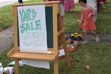 Hand-lettered sign that says Yard Sale