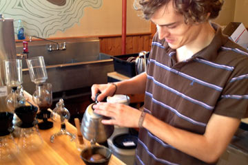 Pouring coffee at Rising Star