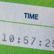 Close-up of E-Check form showing time: 10:57