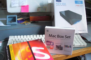 Boxes of software and a hard drive