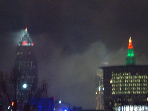 Cleveland skyline with clouds, at night