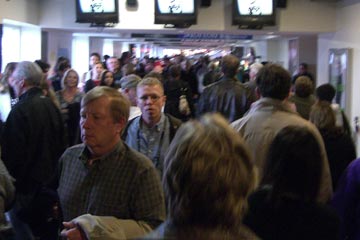 Crowds of people in the hallway