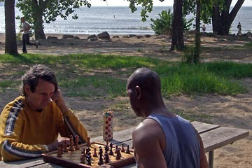 Two men playing chess at Edgewater Park