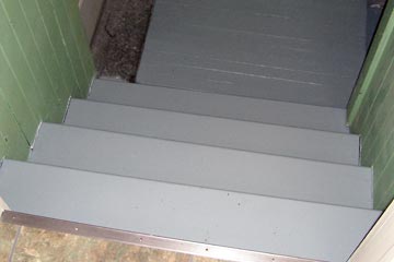 Looking down on freshly-painted basement steps