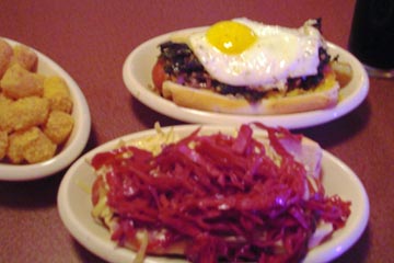 Hot dogs with slaw and fried egg on top