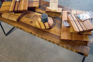 Wooden table covered with cutting boards