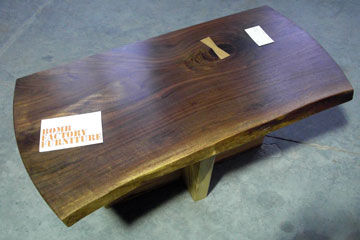 Wooden table with curved edges